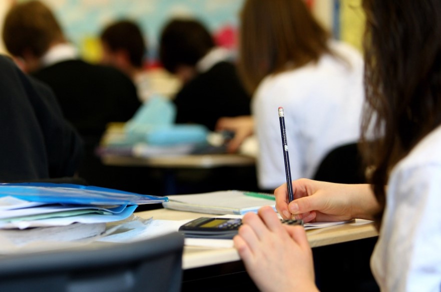 A Student at a Desk